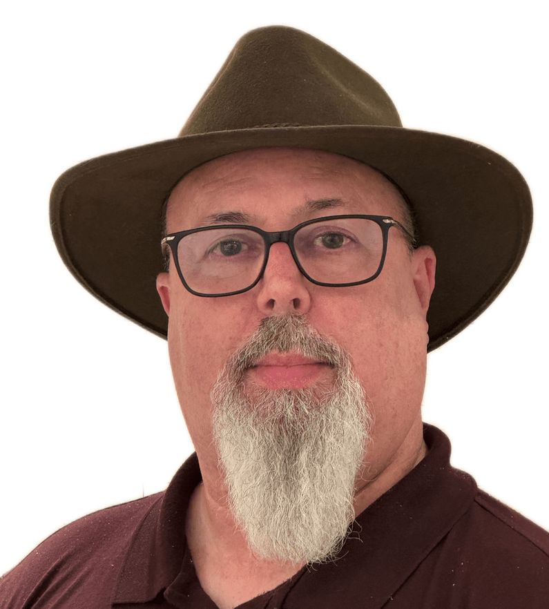 Headshot of the Web Detactive weating a brown hat and glasses.